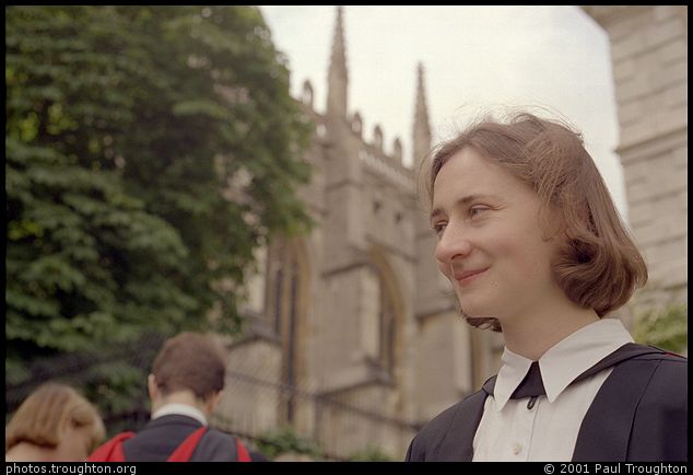 Katy Roucoux with her favourite background - Senate House, Cambridge - Graduation 2001