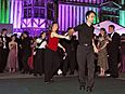 Latin dance demonstration in Cloister Court - Queens' May Ball 2003