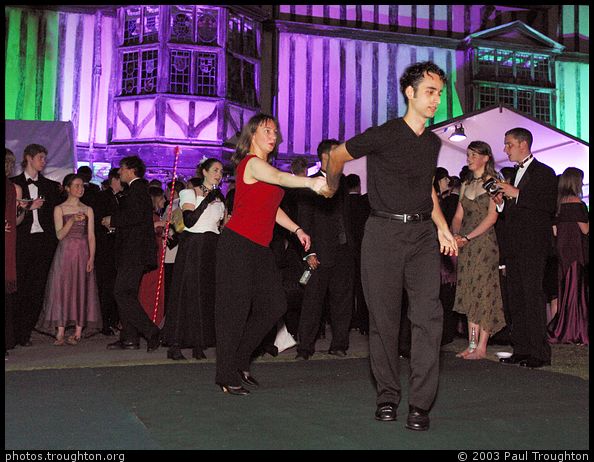 Latin dance demonstration in Cloister Court - Queens' May Ball 2003