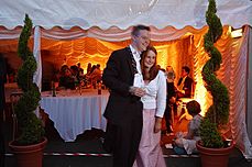 Posing for a photo in Walnut Tree Court - Queens' May Ball 2003