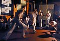 Capoeira, lit by one desk lamp - Carnival at Cafe Afrika, February 2004