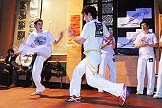 Capoeira, now with UV lighting - Carnival at Cafe Afrika, February 2004