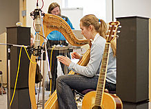 Una Monaghan playing the Irish harp - AES UK Audio Technical Education Day 2005